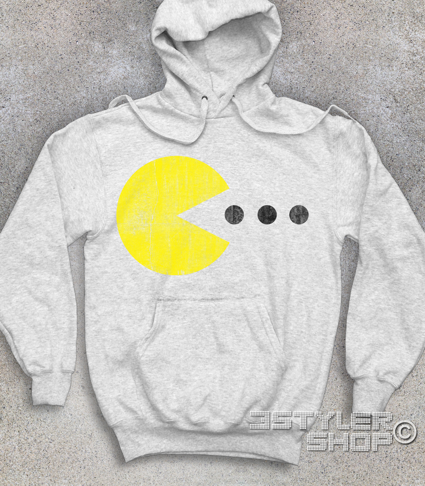 pac man felpa unisex raffigurante pac man che cerca di mangiare tre pillole